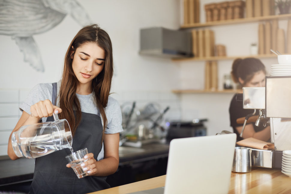 woman pours water