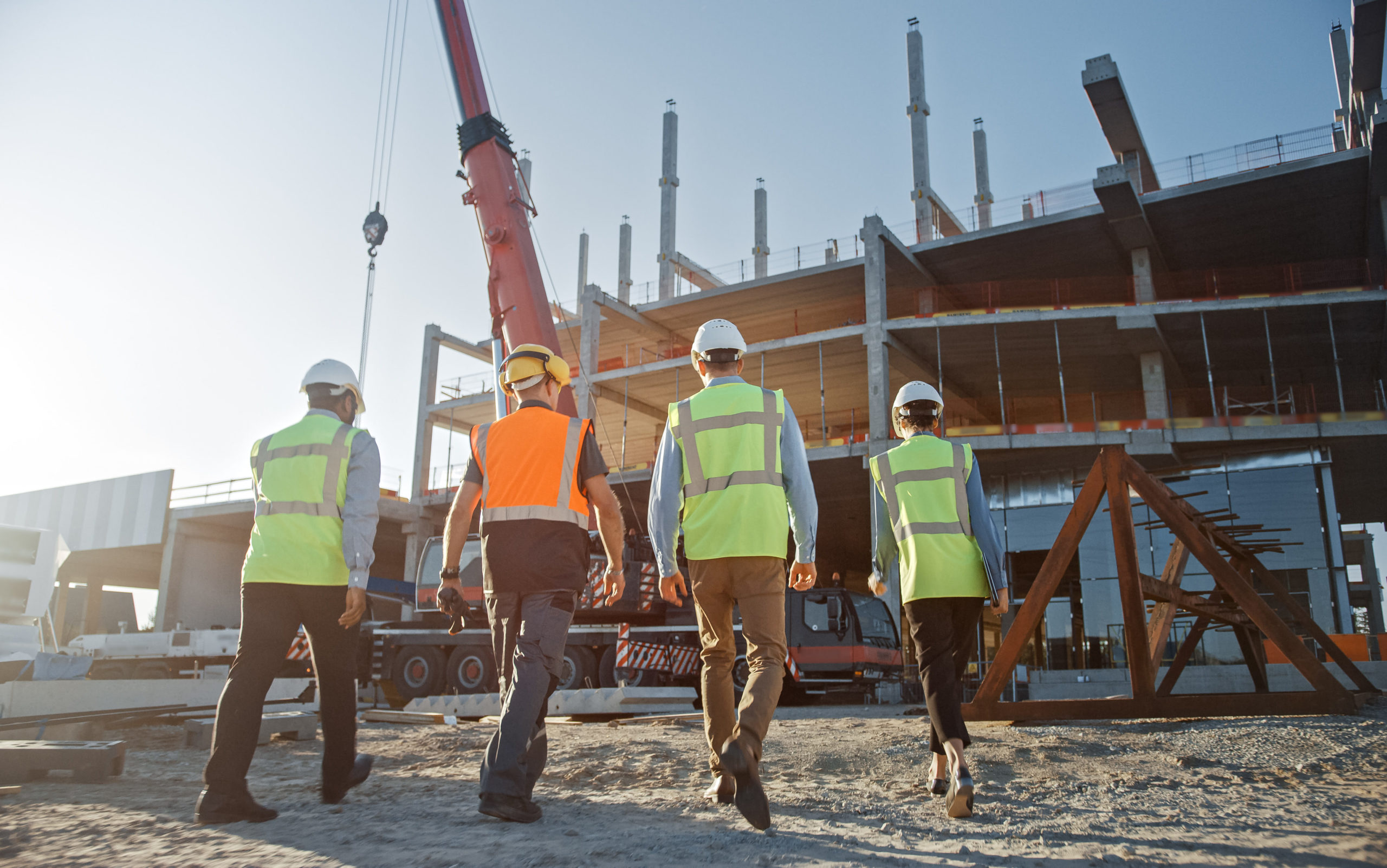 team of workers walks